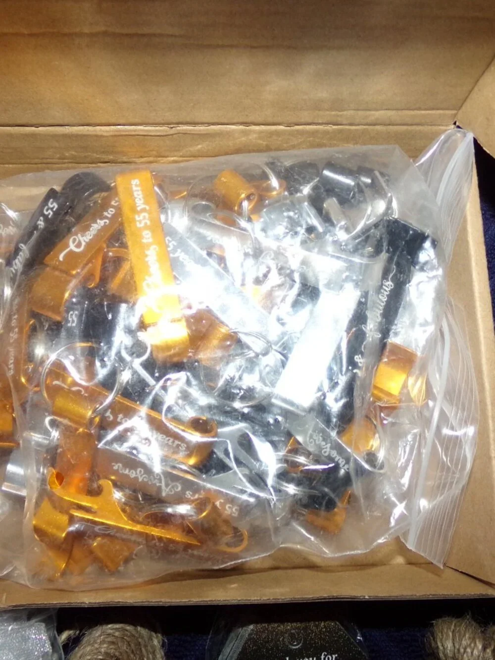 50 - 55th Birthday Party Favors for Guests Include Birthday Beer Opener Keychins